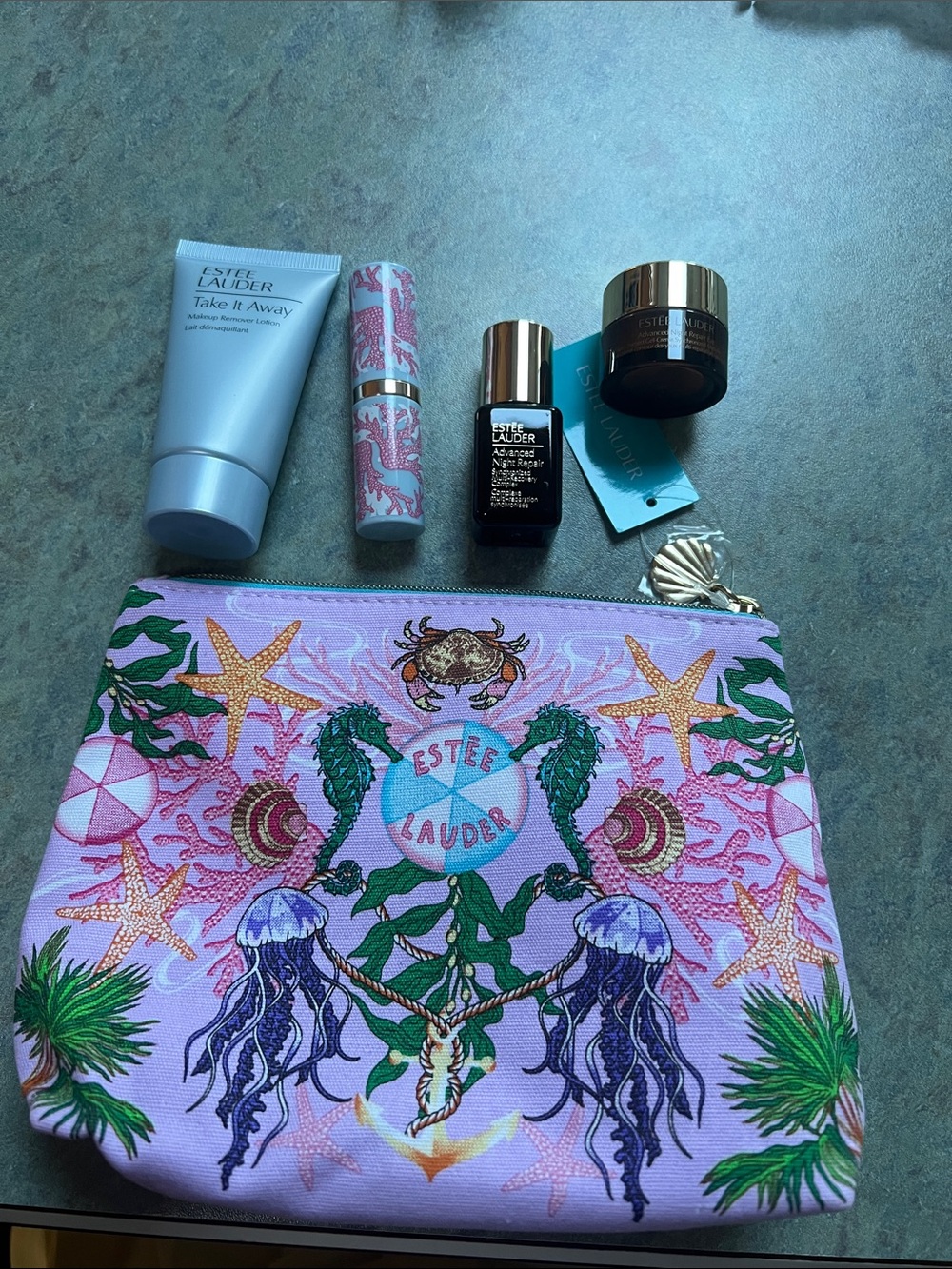 Estee Lauder Pink Seashell Cosmetic Pouch with Assorted Skincare Miniatures